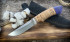 Нож "Лань", клинок сталь K340, след ковки, рукоять наборная береста, тыльник стабилизированная карельская береза фиолетового цвета Нож "Лань", клинок сталь K340, след ковки, рукоять наборная береста, тыльник стабилизированная карельская береза фиолетового цвета
