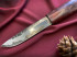Нож "Манси", клинок Ламинат, обкладки сталь 40Х13, сердцевина Дамасская сталь, рукоять стабилизированная карельская береза бордового цвета Нож "Манси", клинок Ламинат, обкладки сталь 40Х13, сердцевина Дамасская сталь, рукоять стабилизированная карельская береза бордового цвета