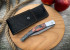 Складной нож "Наваха", клинок сталь ХВ5, накладки на рукоять стабилизированная карельская береза (зелено-красного цвета)